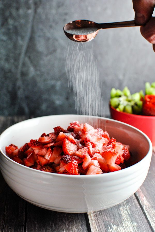 a sprinkle of sugar is the icing on the cake of this strawberry kiwi fruit salsa recipe! it's delicious and easy and SUCH a grow pleaser. | thepikeplacekitchen.com